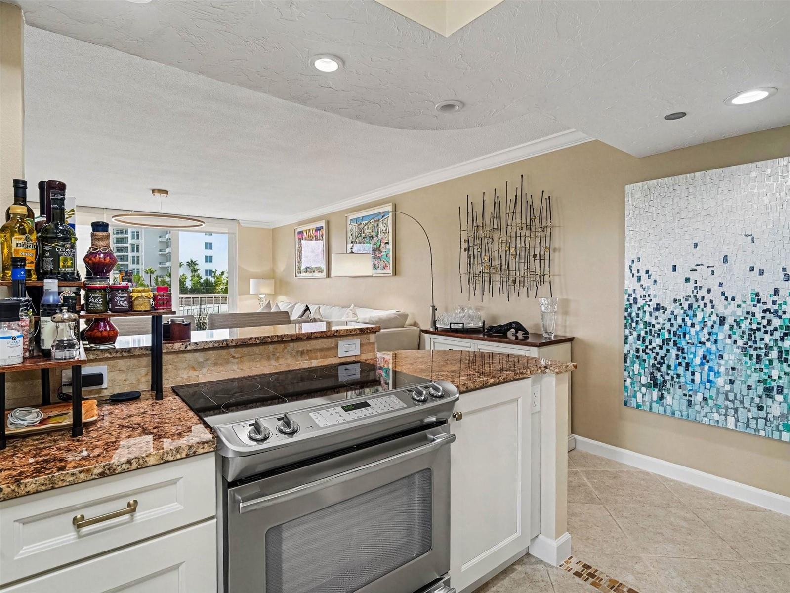 Kitchen opens to Living and Balcony - 775 LONGBOAT CLUB RD #304, LONGBOAT KEY