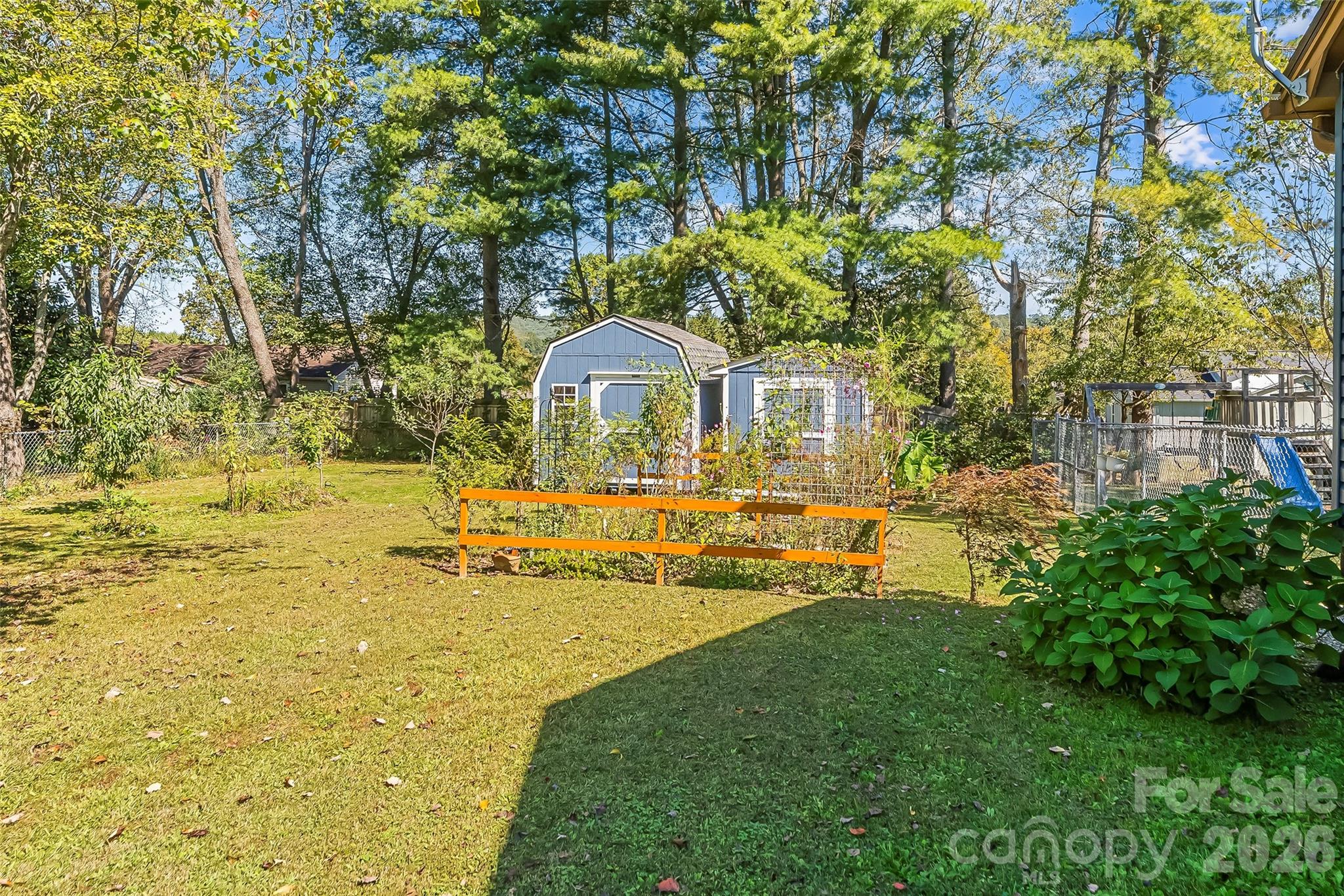 Larger shed does not convey. The smaller shed will remain with property. - 23 E Silverleaf Drive, Hendersonville