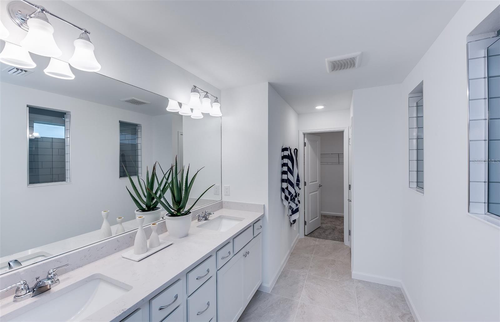 Model Home Design Only. Pictures and furnishings are for illustrative purposes only. Elevations, colors and options may vary. Furniture is for model home staging only. - 3911 MARBURY COURT, DAVENPORT