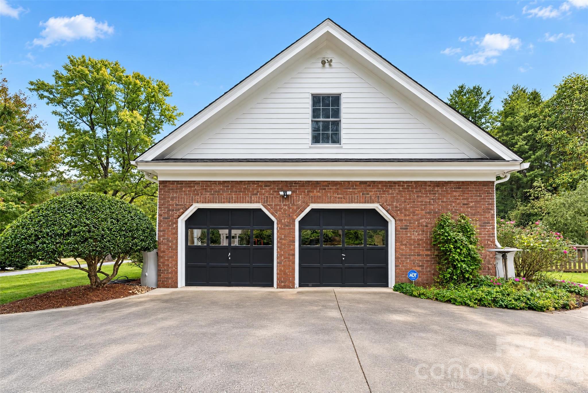 Two car garage with additional parking spaces. - 2715 Brevard Road, Hendersonville