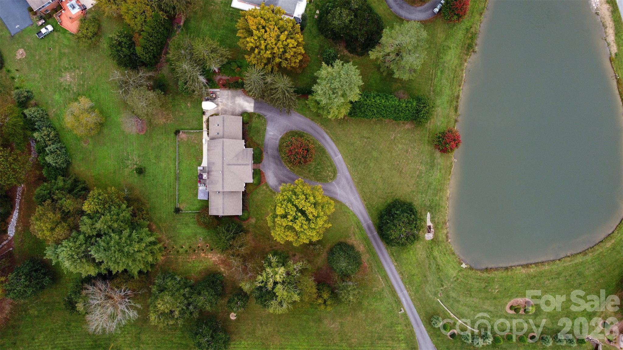 The pond belongs to the community, so no maintenance required! - 2715 Brevard Road, Hendersonville