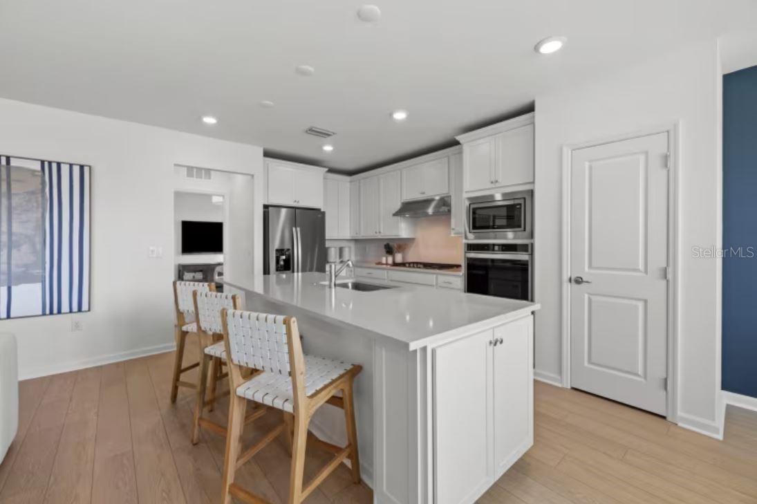 Model Home Design Only. Pictures and furnishings are for illustrative purposes only. Elevations, colors and options may vary. Furniture is for model home staging only. - 4738 HARRINGTON FIELDS DRIVE, DAVENPORT