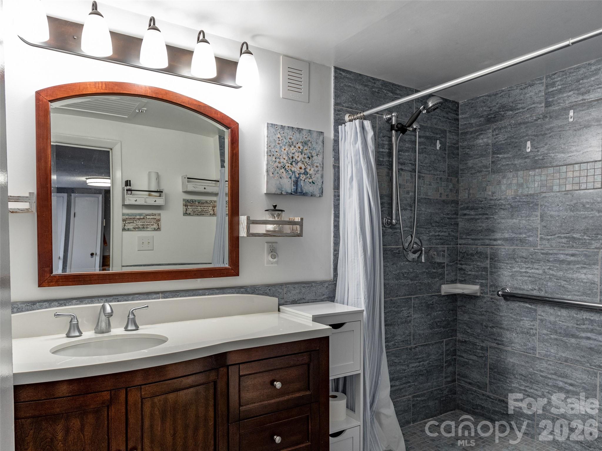 Bath with tile shower and floor - 12982 US 19W Highway, Burnsville