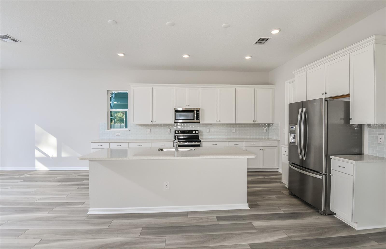 Model Home Design Only. Pictures and furnishings are for illustrative purposes only. Elevations, colors and options may vary. Furniture is for model home staging only. - 4730 HARRINGTON FIELDS DRIVE, DAVENPORT
