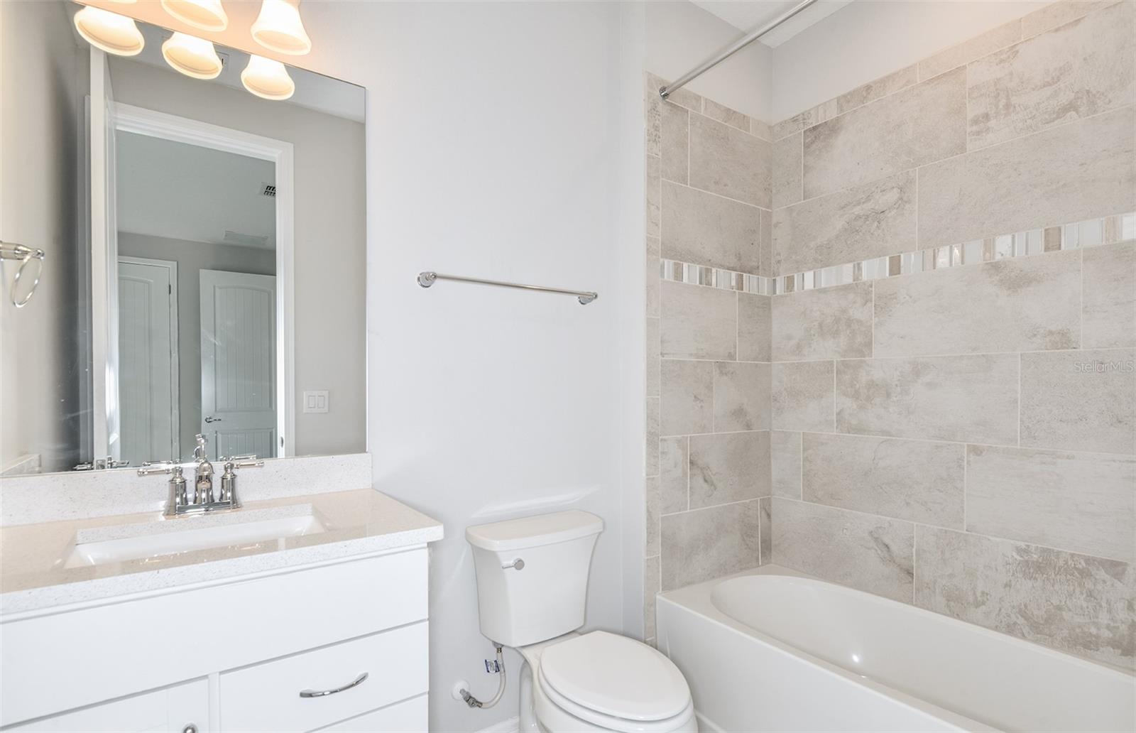Model Home Design Only. Pictures and furnishings are for illustrative purposes only. Elevations, colors and options may vary. Furniture is for model home staging only. - 4730 HARRINGTON FIELDS DRIVE, DAVENPORT