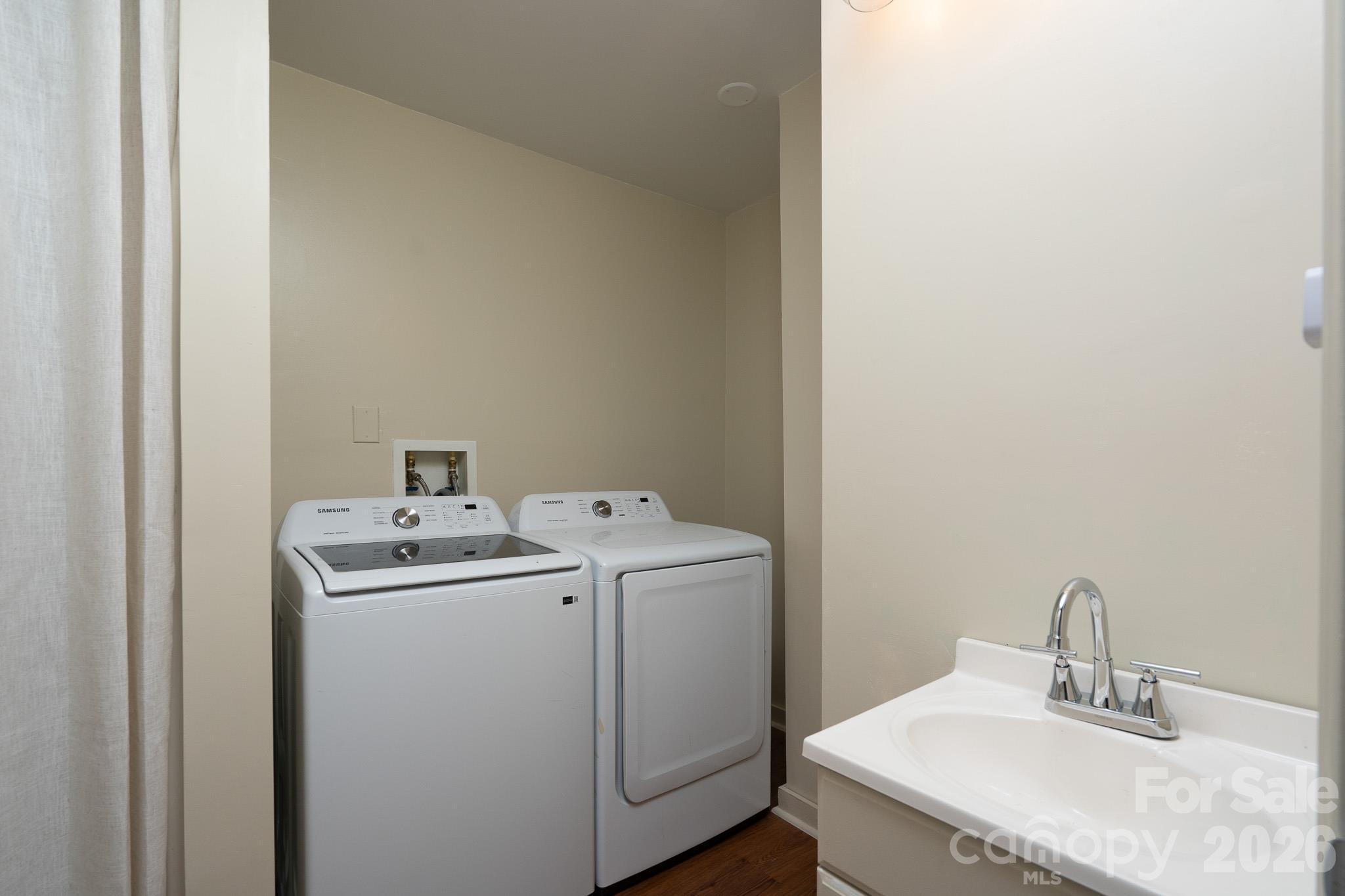 Full bath and laundry in lower level hall - 192 Tillery Park Drive, Mount Gilead