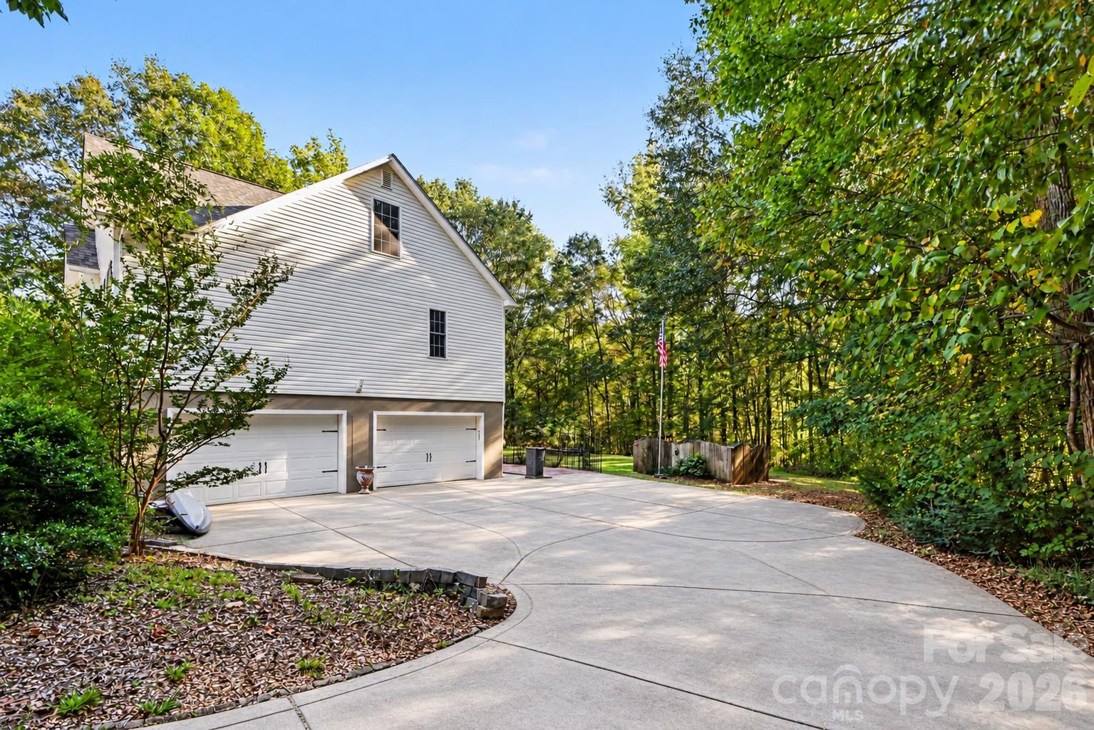 HUGE GARAGE with extra storage space and shelves. - 9133 Sunrise Meadow Road, Indian Land