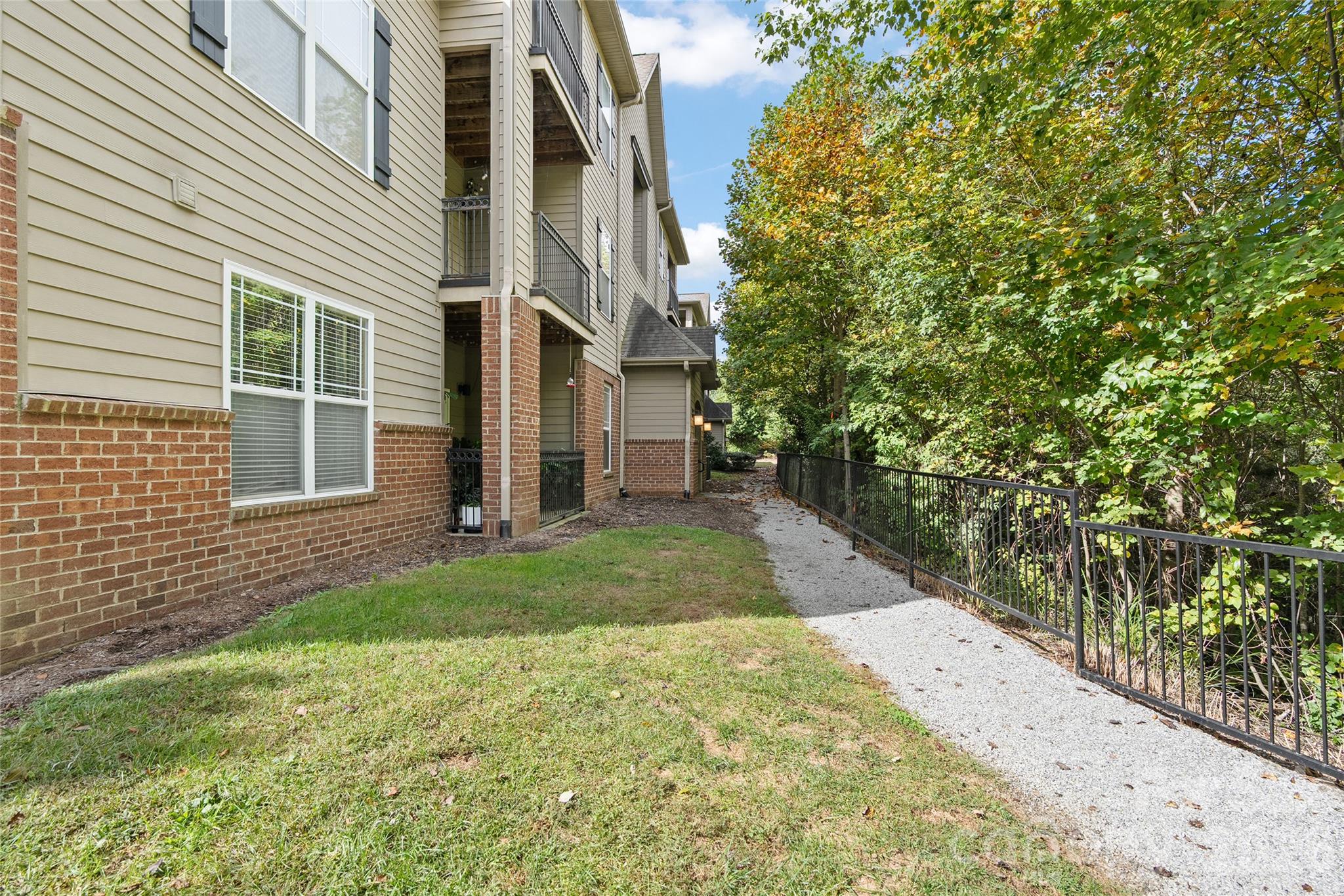 Walking trails behind the unit. - 234 Brickton Village Circle, Fletcher