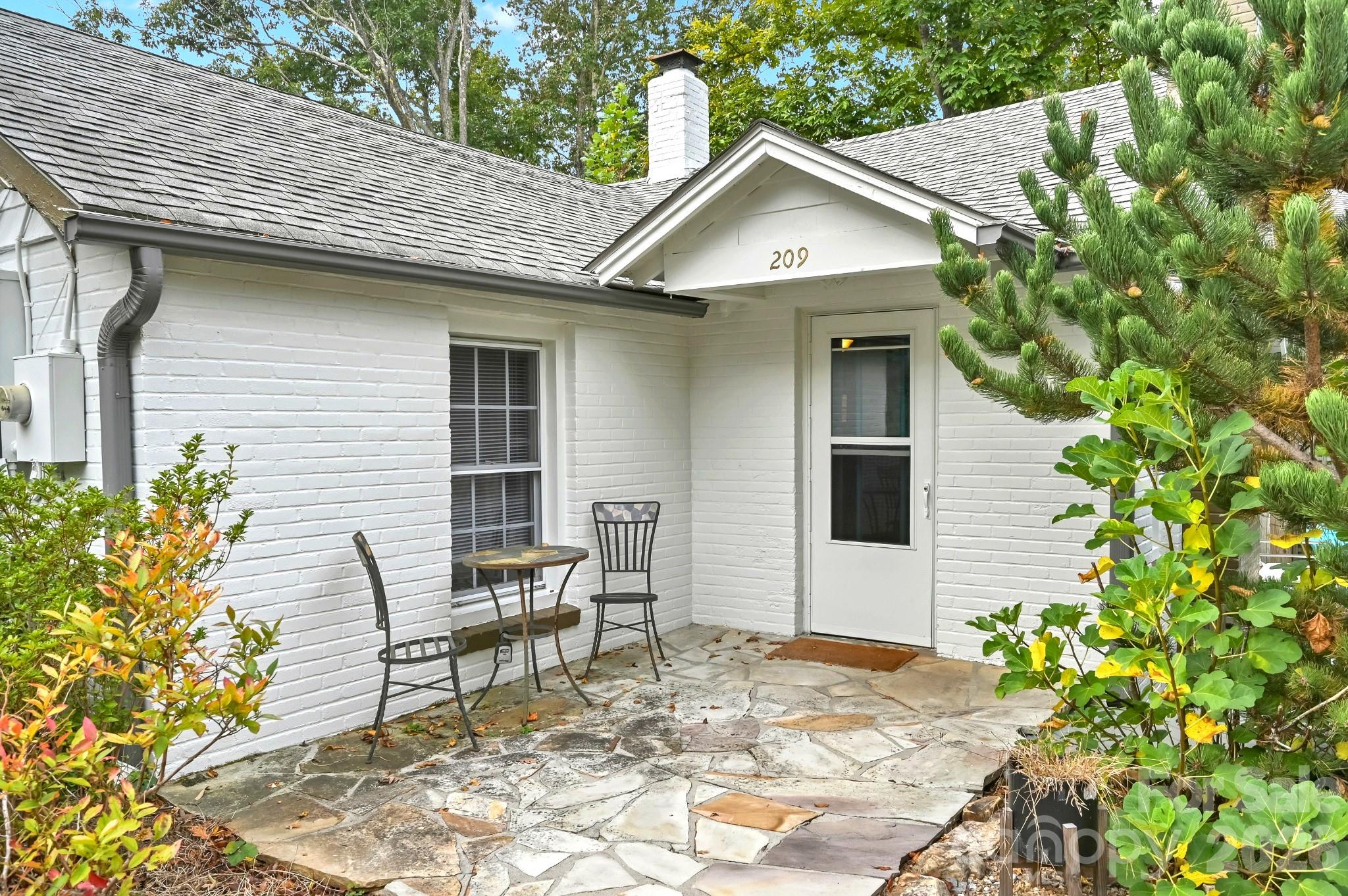 Entry into living room - 209 Old Haw Creek Road, Asheville
