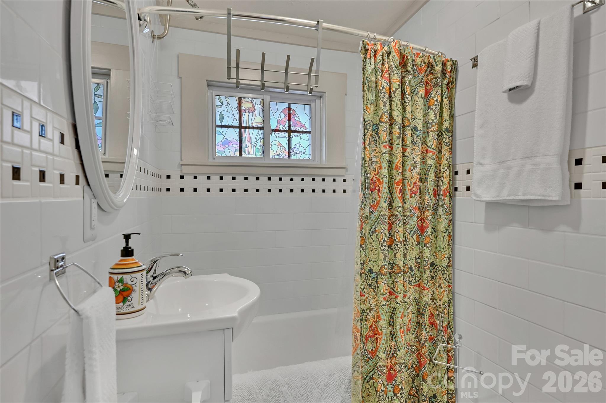Hall bath with tub - 209 Old Haw Creek Road, Asheville