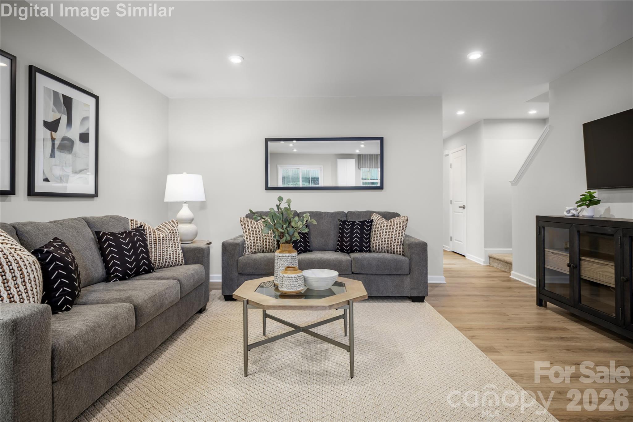 Roomy yet cozy—this inviting family space is made for relaxing, entertaining, and creating unforgettable moments. - 5215 Macvittie Lane, Charlotte