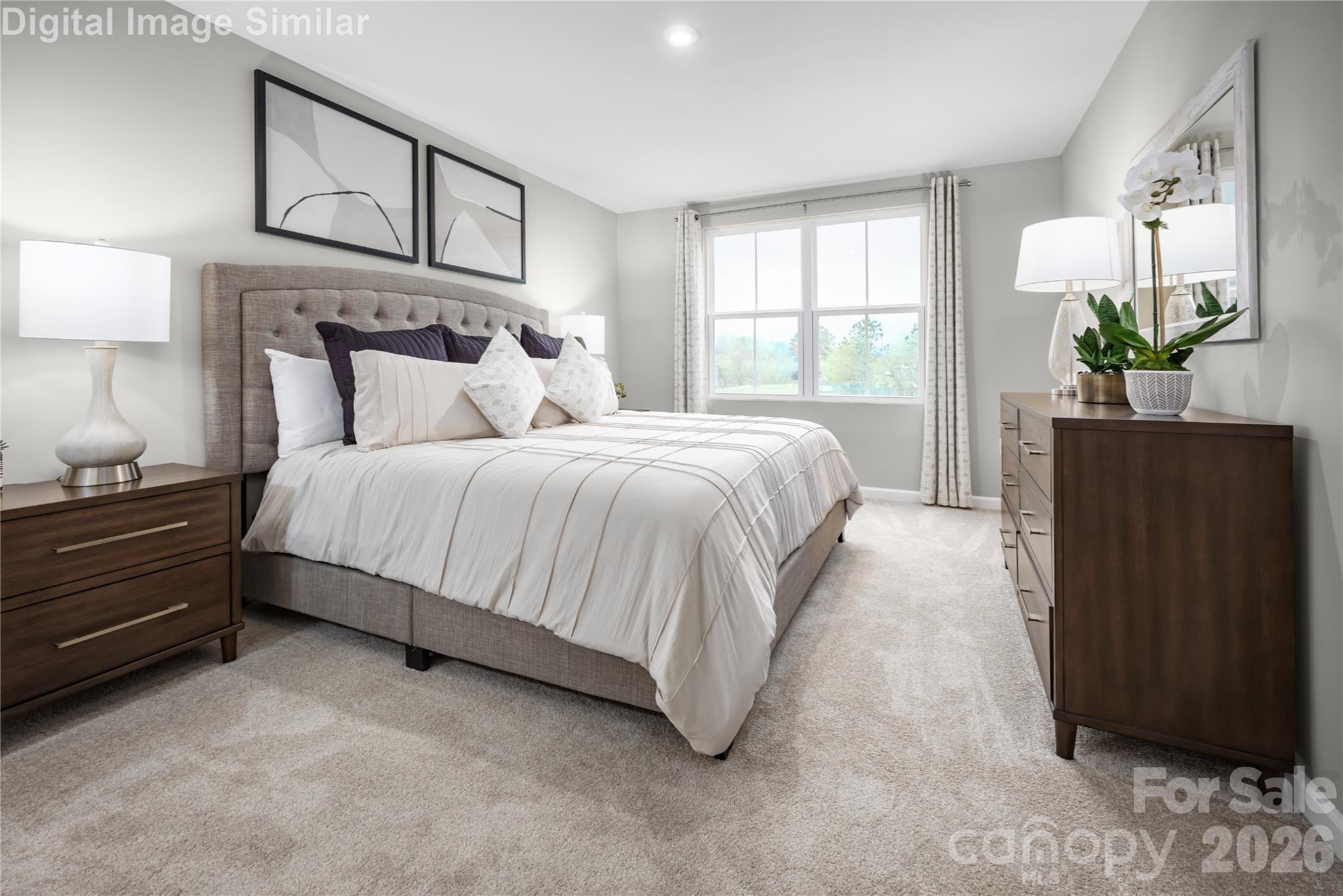 Your private escape awaits—this spacious owner’s suite features a luxe bath and an oversized walk-in closet for ultimate comfort and convenience. - 5215 Macvittie Lane, Charlotte