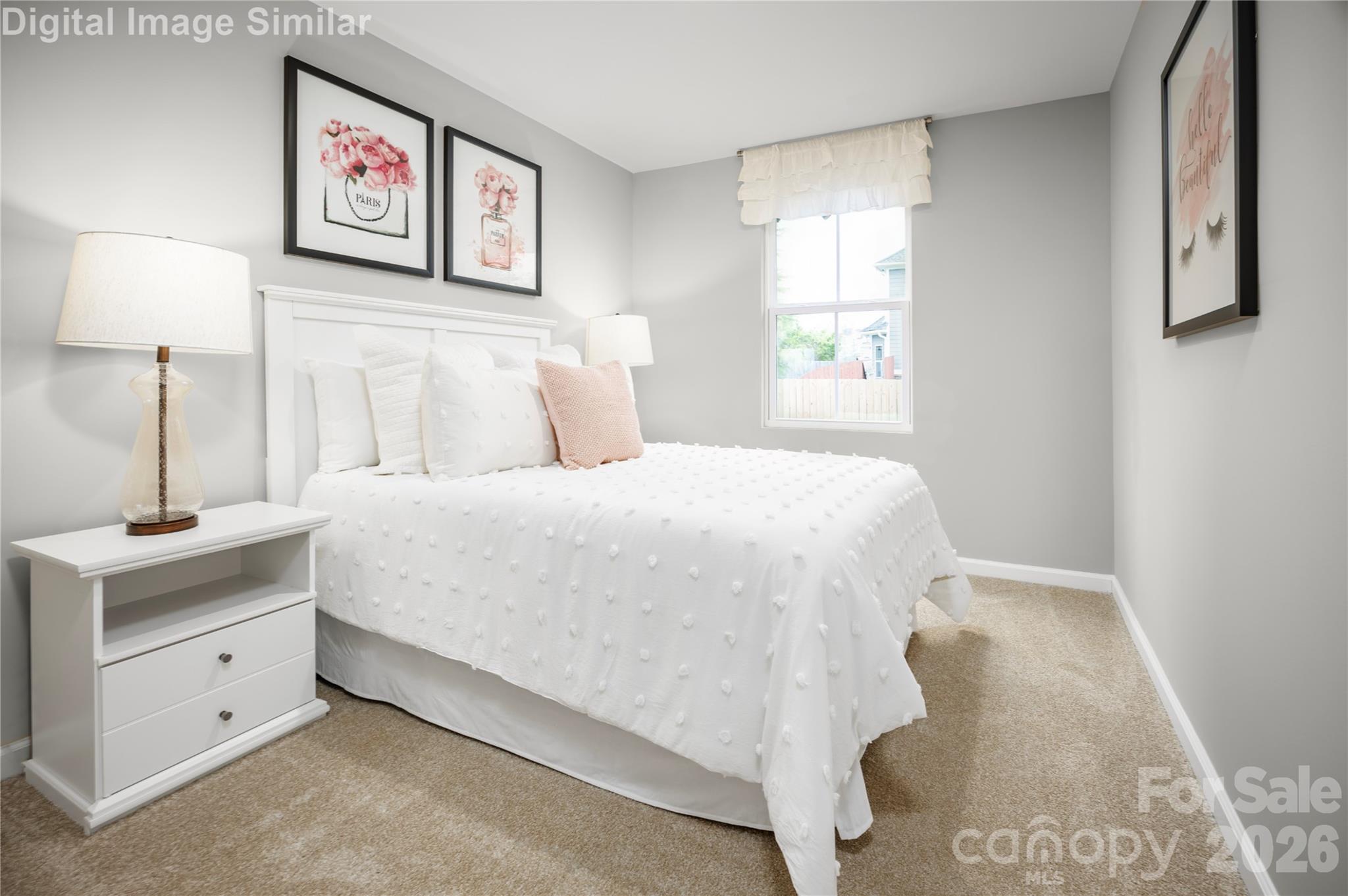 Bright and adaptable—this second bedroom offers generous closet space and endless possibilities for your unique style and needs - 5215 Macvittie Lane, Charlotte