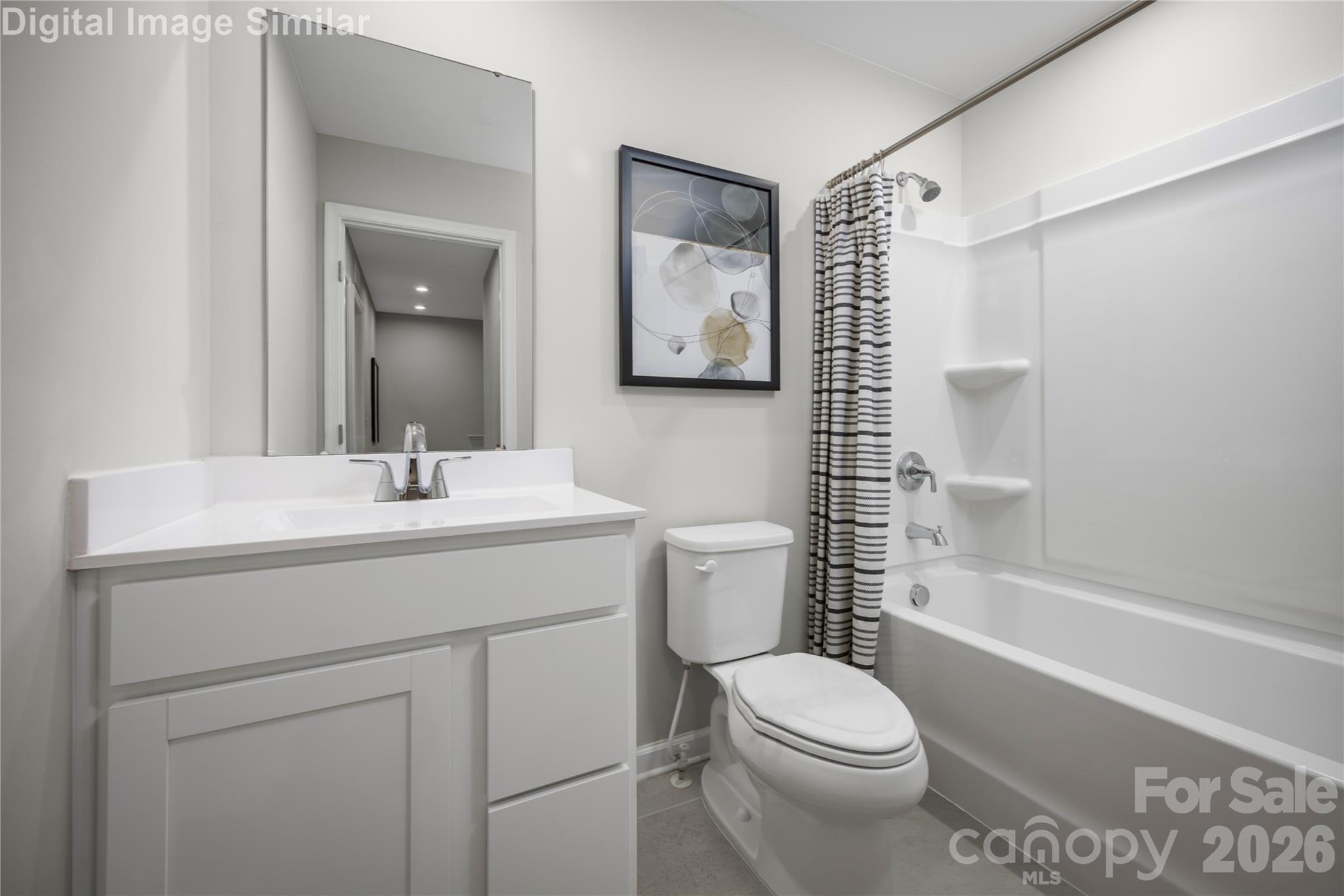 Stylish and practical—this shared guest bath offers sleek finishes and everyday comfort for effortless living. - 5219 Macvittie Lane, Charlotte