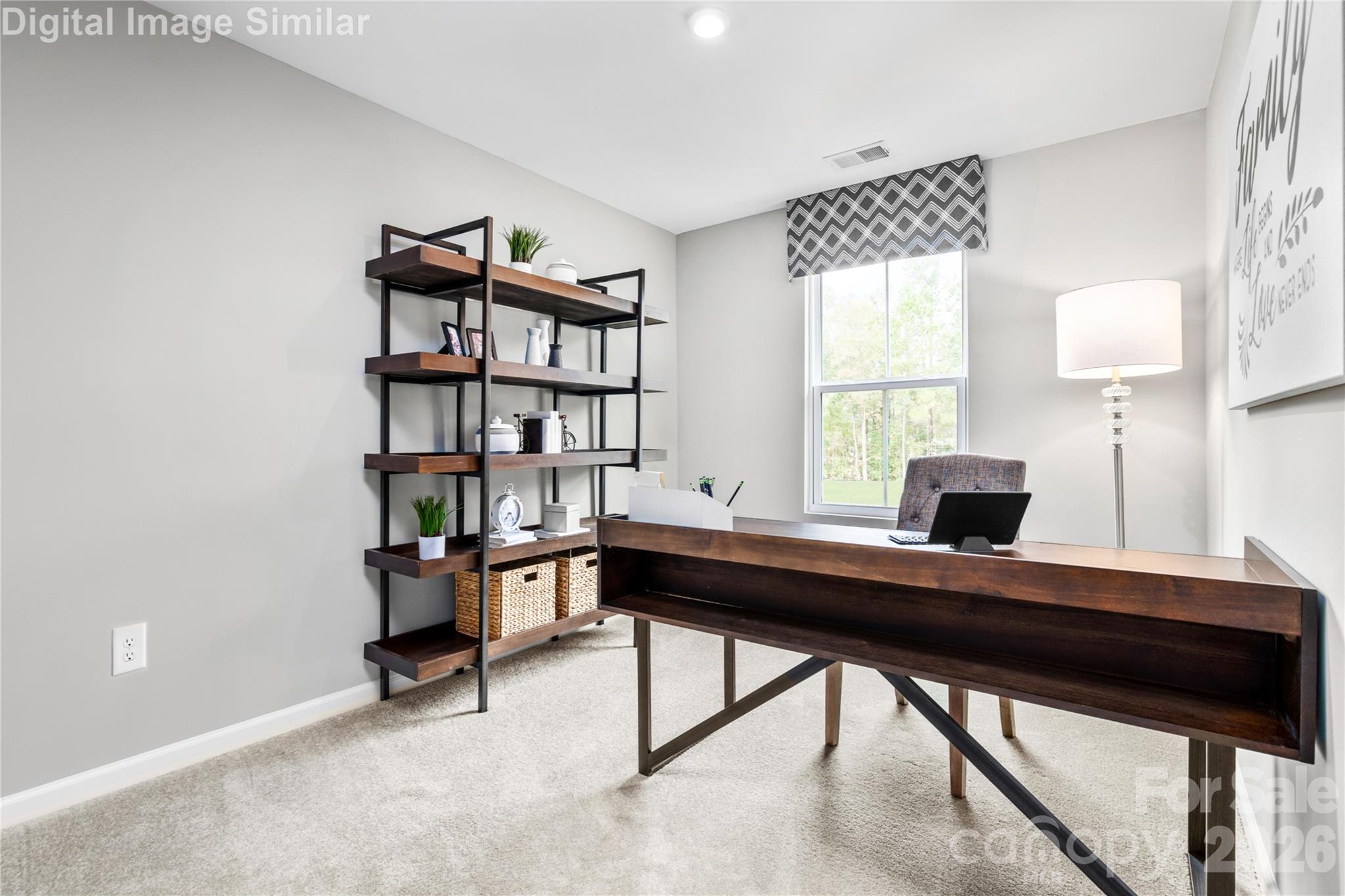 Bright, comfortable, and full of potential—this spacious second bedroom with a roomy closet is perfect for guests, work-from-home days, or your personal retreat. - 5223 Macvittie Lane, Charlotte
