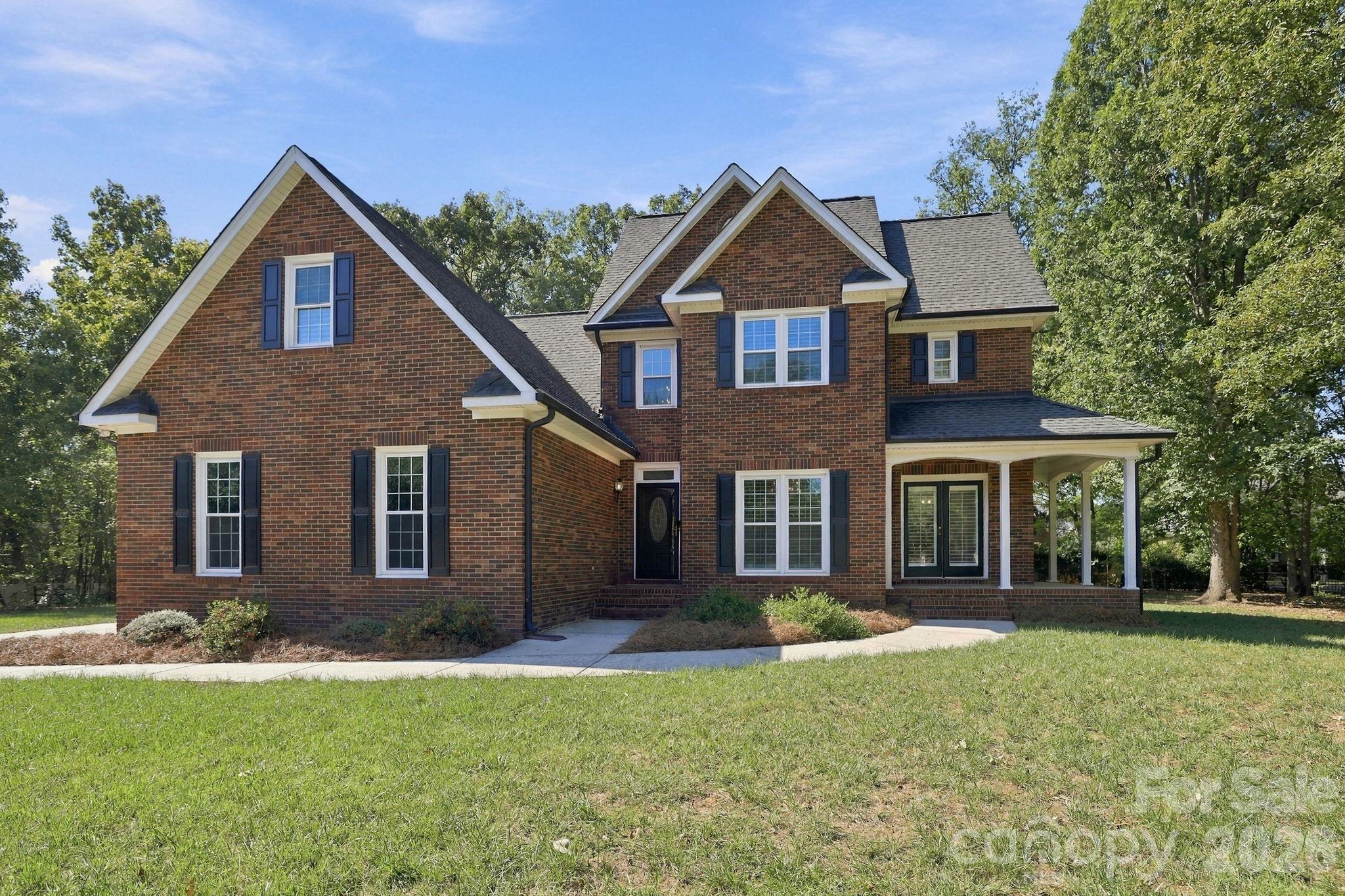 Full BrickFront Exterior1471 Porch Swing Lane Matthews, NC 28104 - 1471 Porch Swing Lane, Matthews