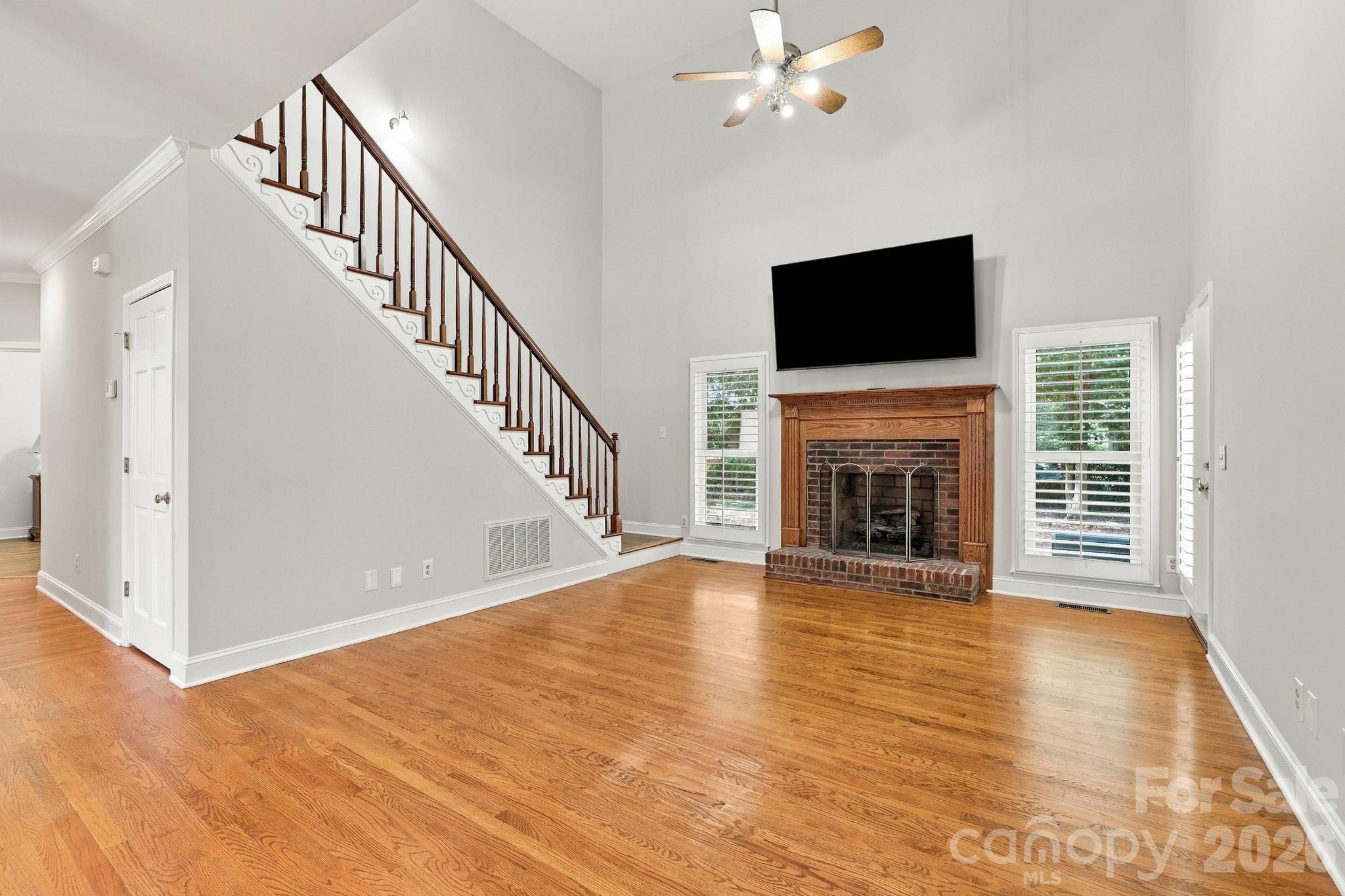 Great Room with Rear Staircase1471 Porch Swing Lane Matthews, NC 28104 - 1471 Porch Swing Lane, Matthews