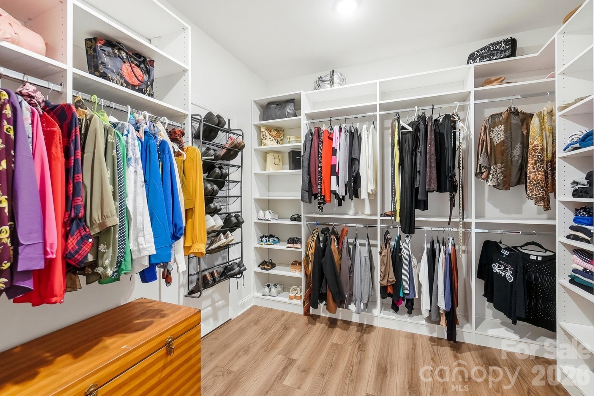 Custom Closet in primary bedroom leading to laundry room - 2014 Old Evergreen Parkway, Indian Trail