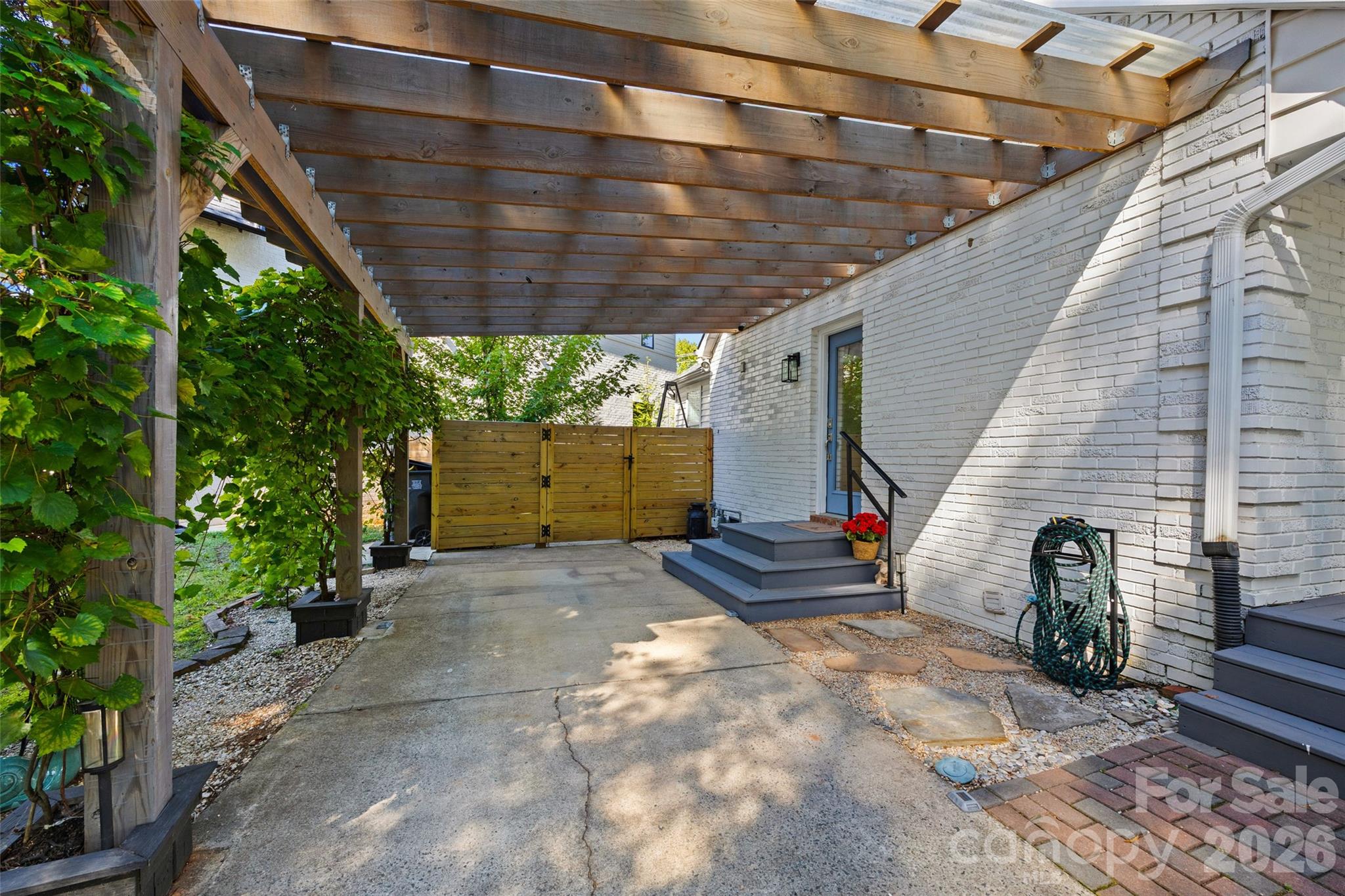 Covered parking with side entrance - 5145 Murrayhill Drive, Charlotte