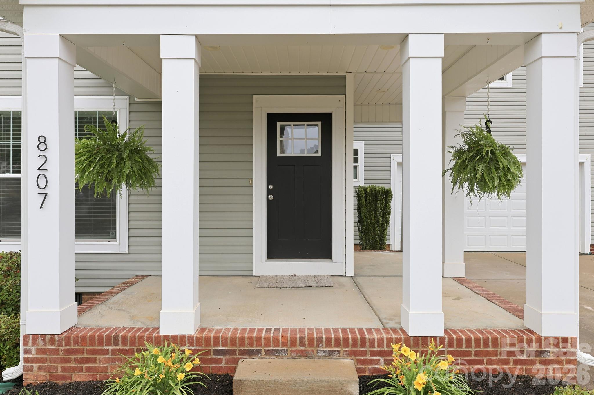 Single Family Residence at 8207 Dumphries Drive, Huntersville, photo 2 of 40