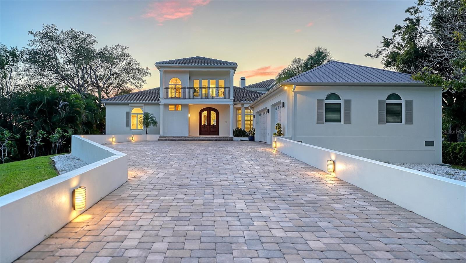 Lighted driveway at dusk - 2115 LYCHEE LN, NOKOMIS