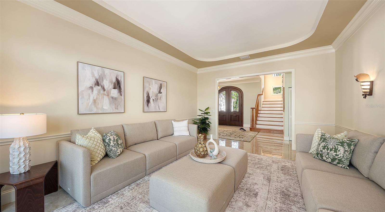 the stairs lead to two separate guest en suite bedrooms - 2115 LYCHEE LN, NOKOMIS