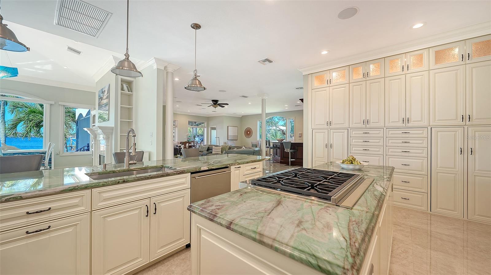 floor to ceiling cabinets, kitchen opens to family room - 2115 LYCHEE LN, NOKOMIS