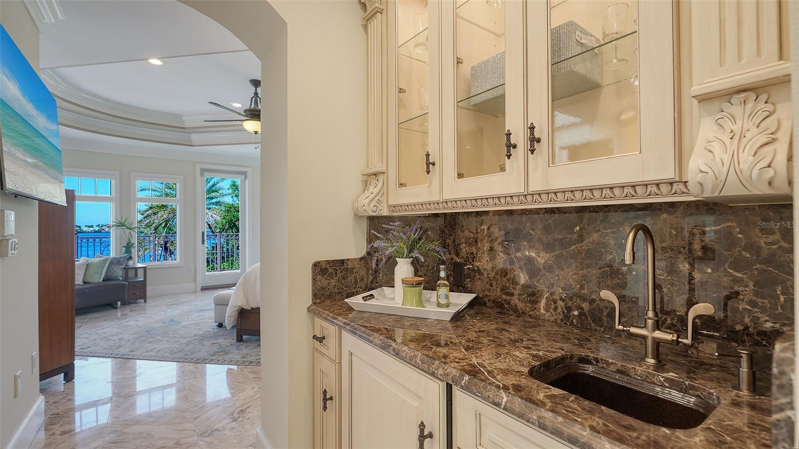 wet bar off the bedroom ideal for cocktail hour on your private balcony or morning coffee - 2115 LYCHEE LN, NOKOMIS