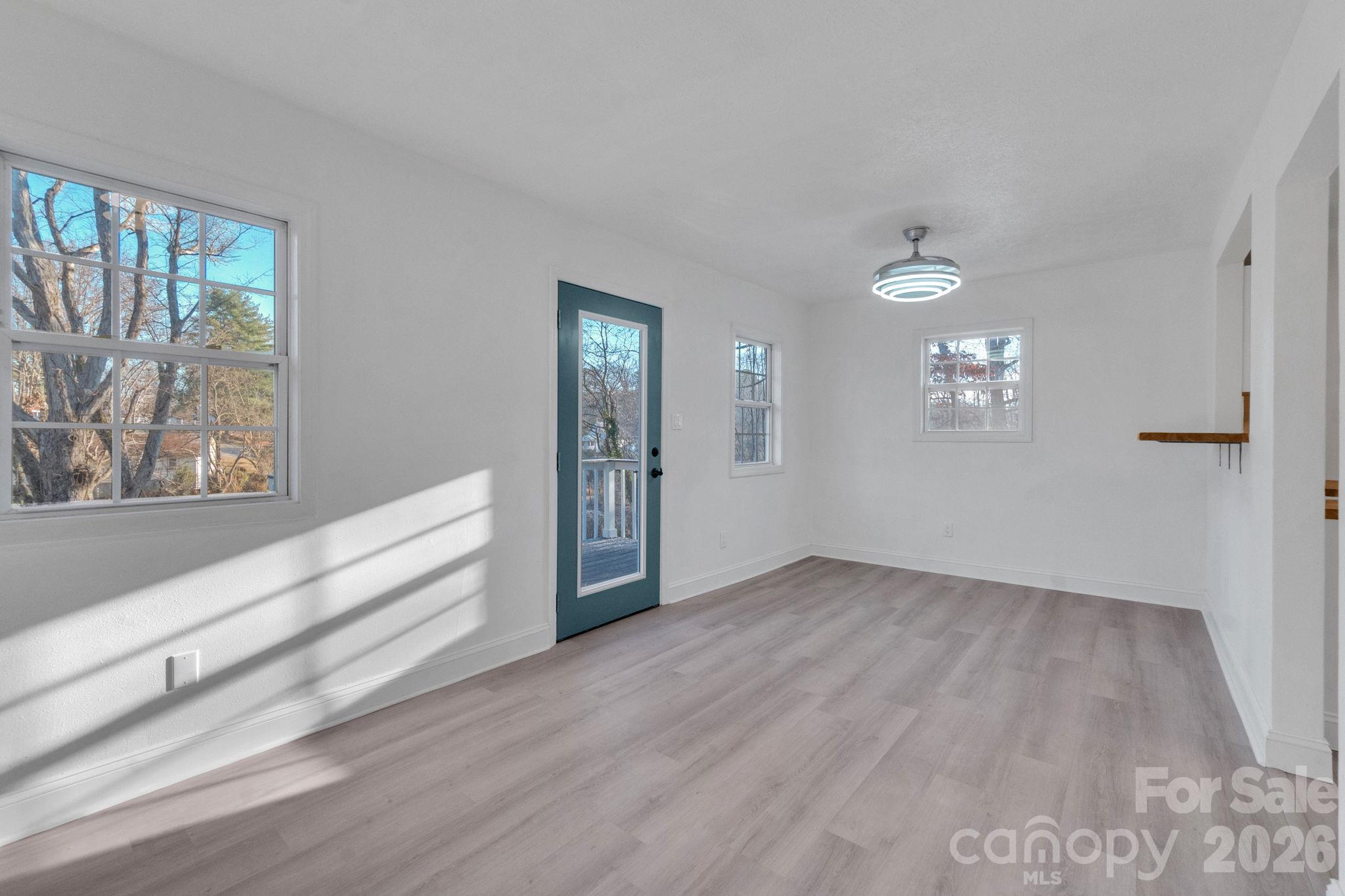 Door leads to the deck. Breakfast bar at the pass-through. - 49 Livingston Street, Tryon