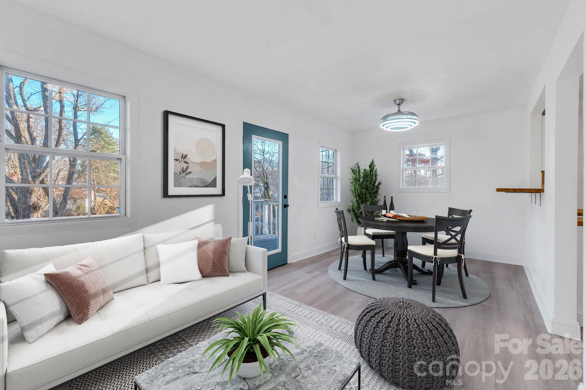 Virtually staged living and dining spaces. - 49 Livingston Street, Tryon