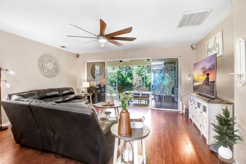 Living Room with view to back yard - 3876 WHISTLEWOOD CIR, LAKELAND