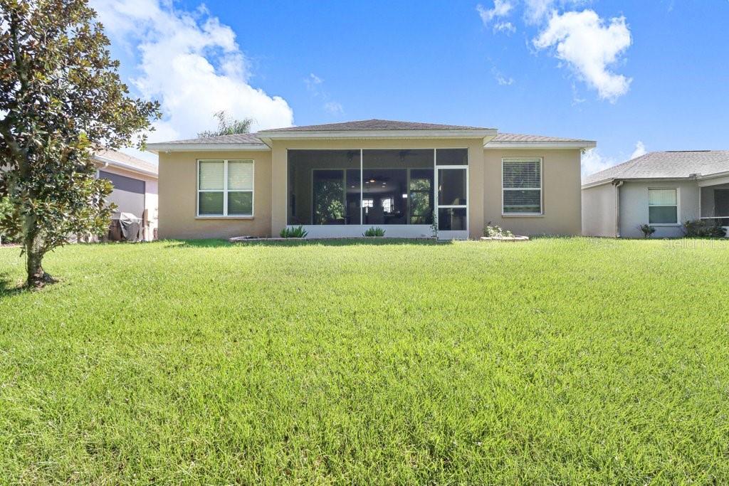 Rear view of home - 3876 WHISTLEWOOD CIR, LAKELAND