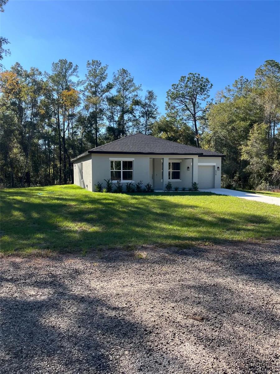 Single Family Residence at 524 E AVONDALE DR, DUNNELLON, photo 8 of 42