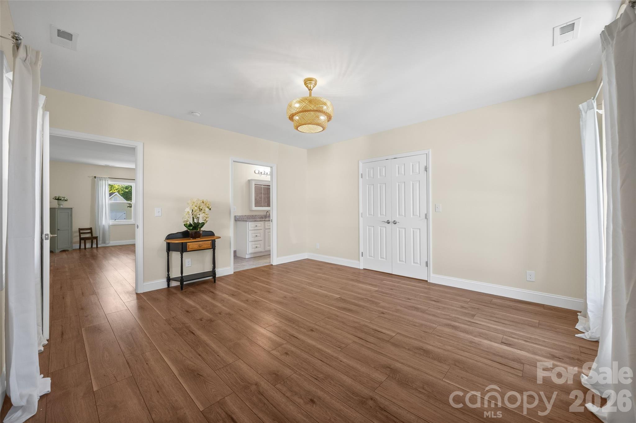 Flex room on office addition has Closet, laundry, storage and an adjacent full bathroom. - 3117 Monte Drive, Monroe