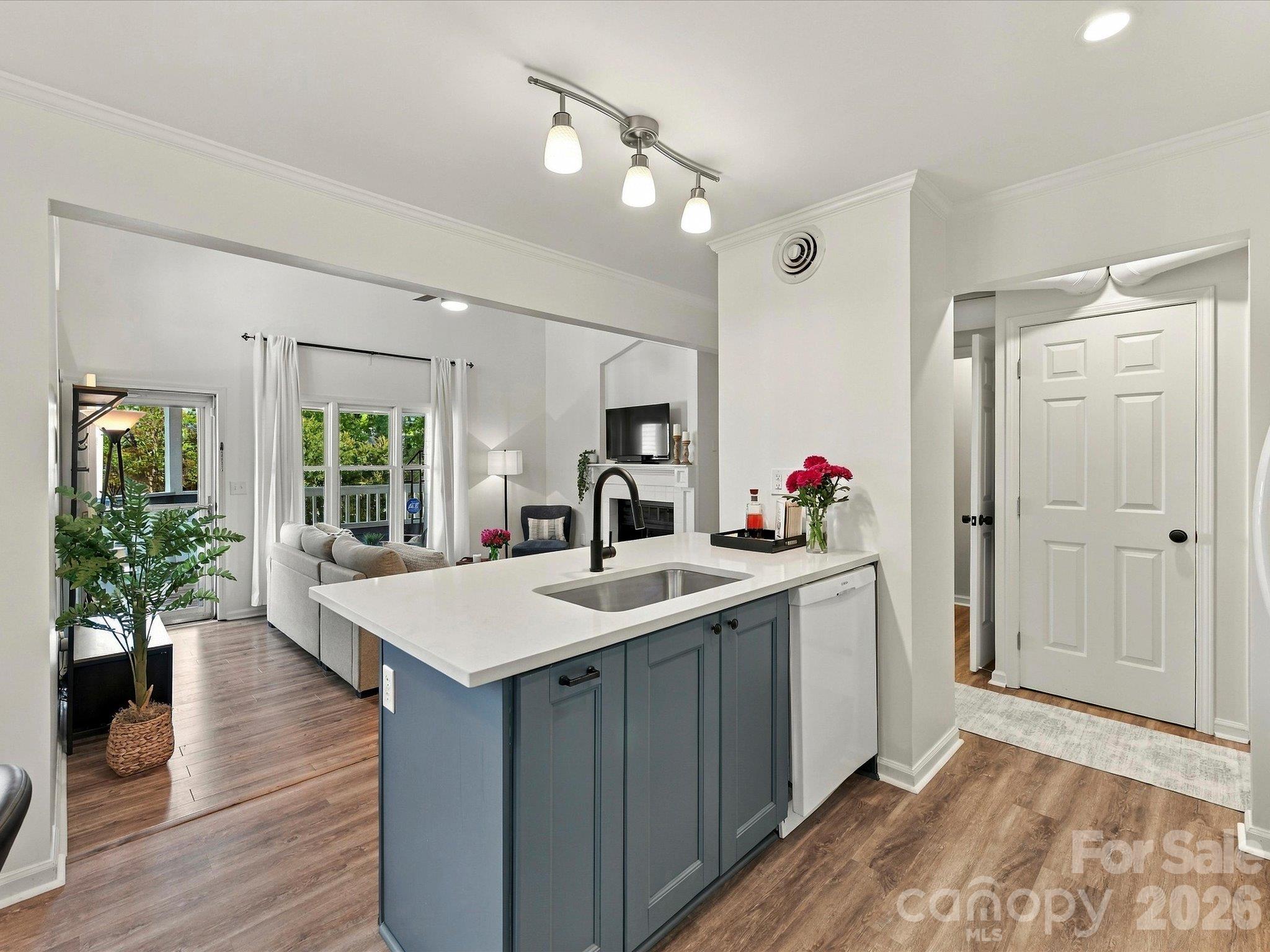 Kitchen with view of living room - 423 W 8th Street, Charlotte