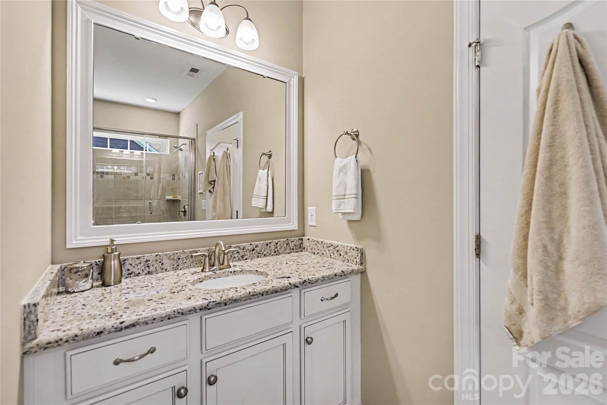 Primary bathroom has separate vanities - 1567 Tranquility Boulevard, Lancaster
