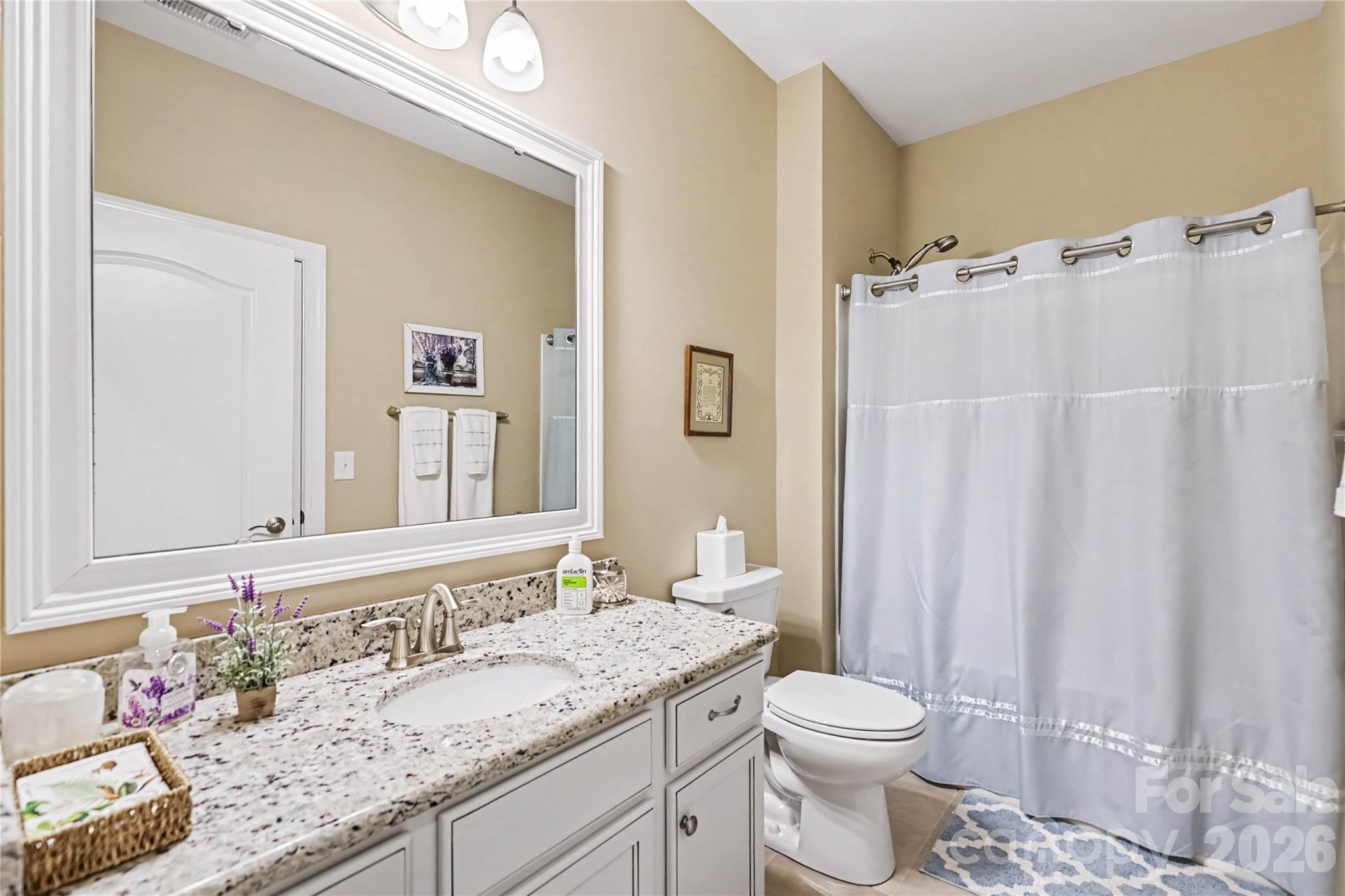 Bathroom opens to bedroom 2 and has additional door to hallway - 1567 Tranquility Boulevard, Lancaster