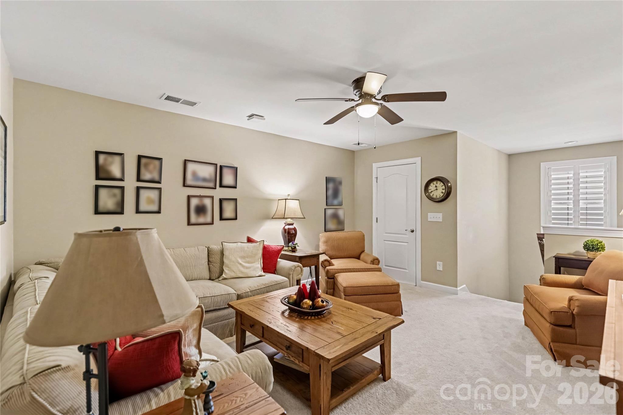 Upstairs bonus areahas a storage closet with custom shelves and 2 additional attic storage areas - 1567 Tranquility Boulevard, Lancaster