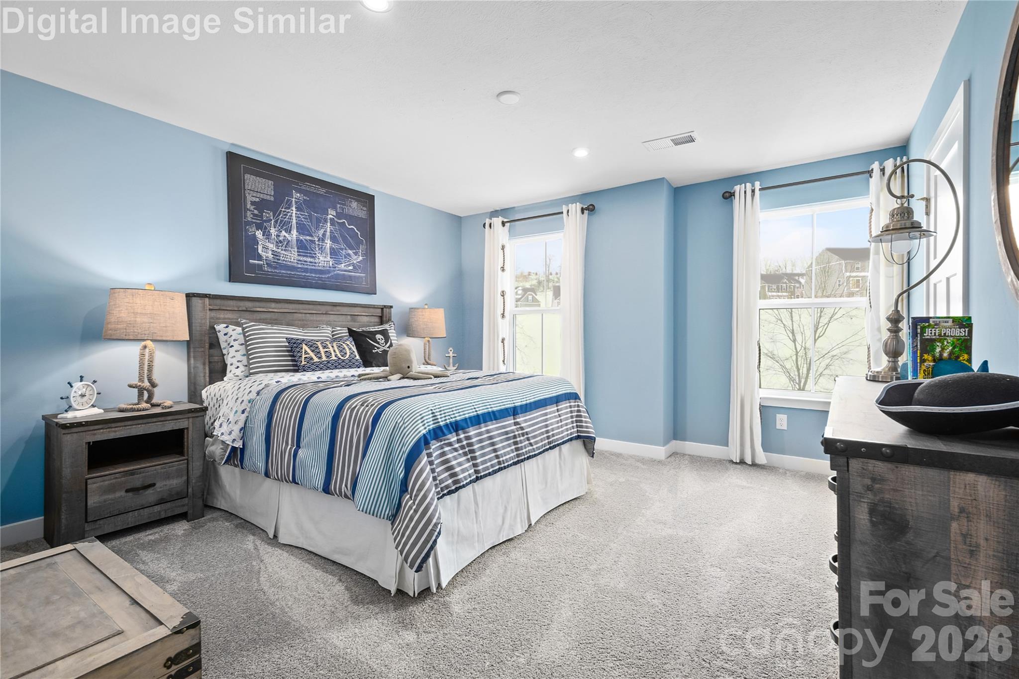 A bright and imaginative space with large windows that invite natural light—perfect for pirate dreams, sunken ships, or whatever your heart desires. Spacious enough to grow with your child or transform into a retreat. - 11204 Emerson Landing Drive, Charlotte