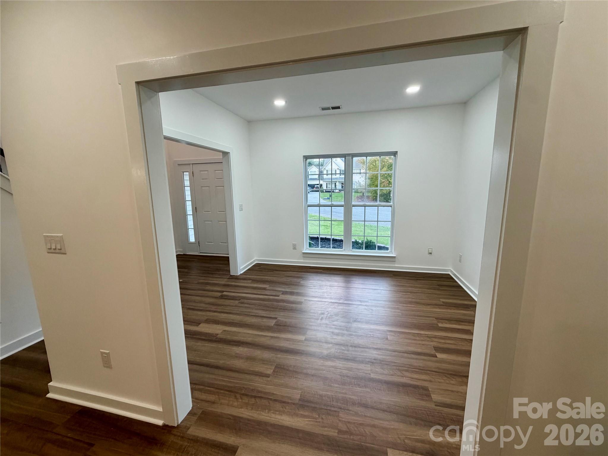 View from Den to Dining Room , NEW LVP Flooring on main level. - 116 Huckleberry Lane, Mount Holly