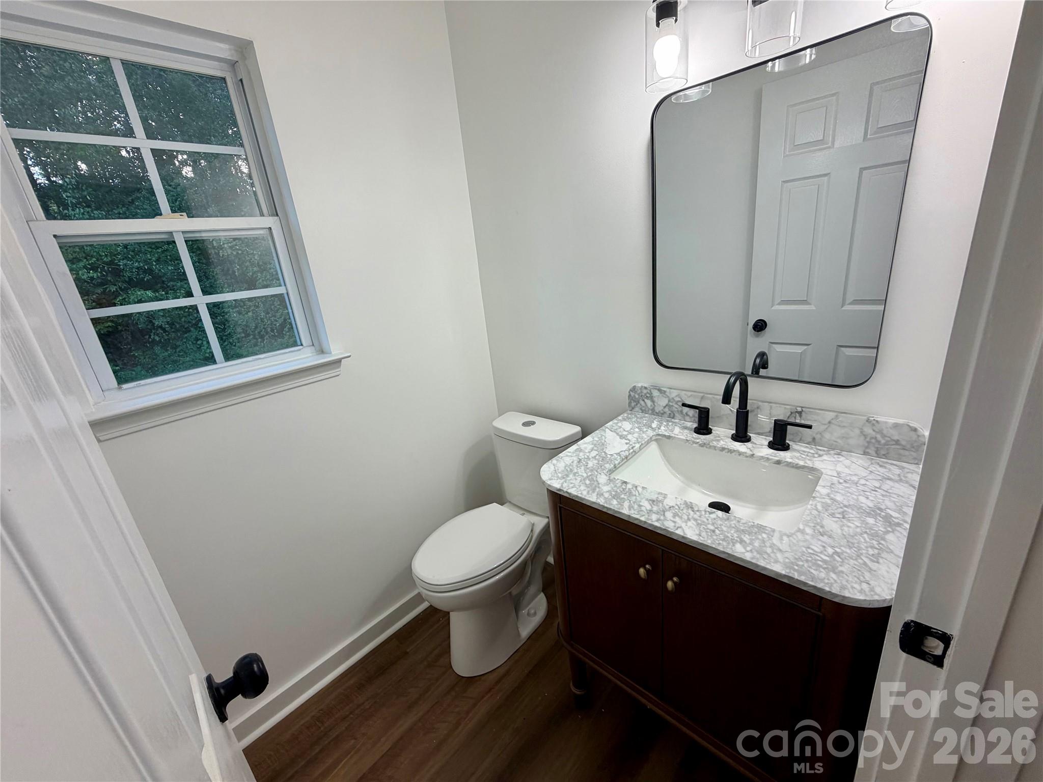 Half Bath on main level. NEW LVP Flooring on main level. - 116 Huckleberry Lane, Mount Holly