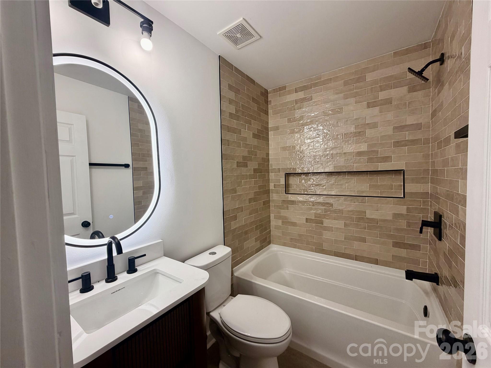 Full Bathroom in Hall upstairs - New Sunken tub to relax in, New Tile Upstairs Hall shared Bath - Surround Tile and new tile floors, New Vanity and Heated Lighting Mirror - 116 Huckleberry Lane, Mount Holly