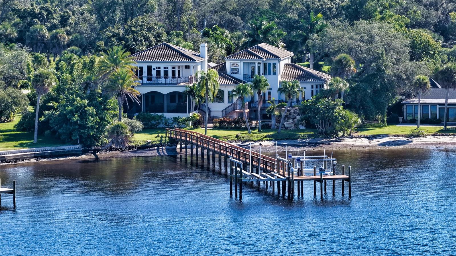 View of the property from the water - 2115 LYCHEE LN, NOKOMIS