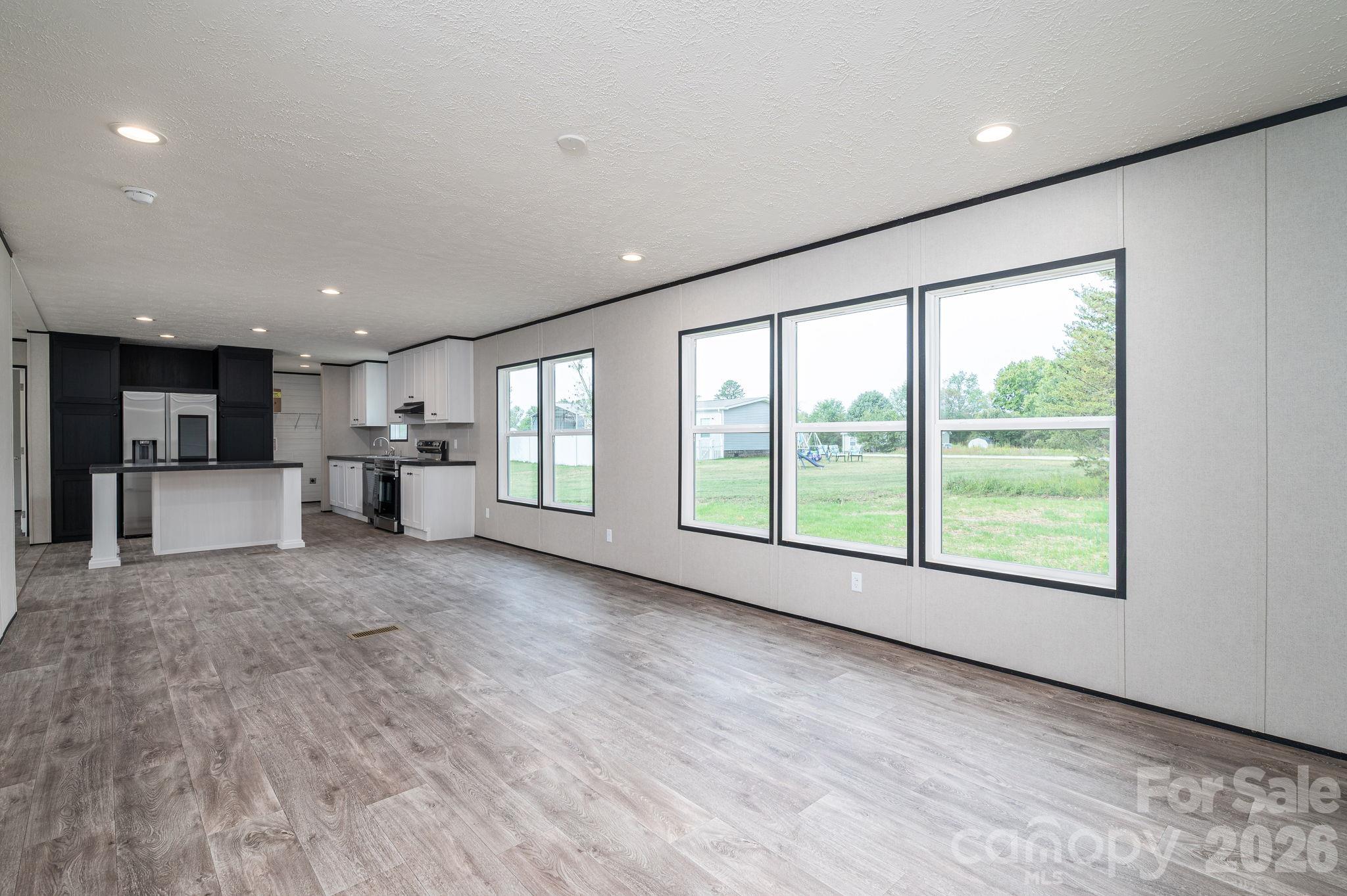 Large Living/Dining Area - 207 Grassy Field Court, Lawndale