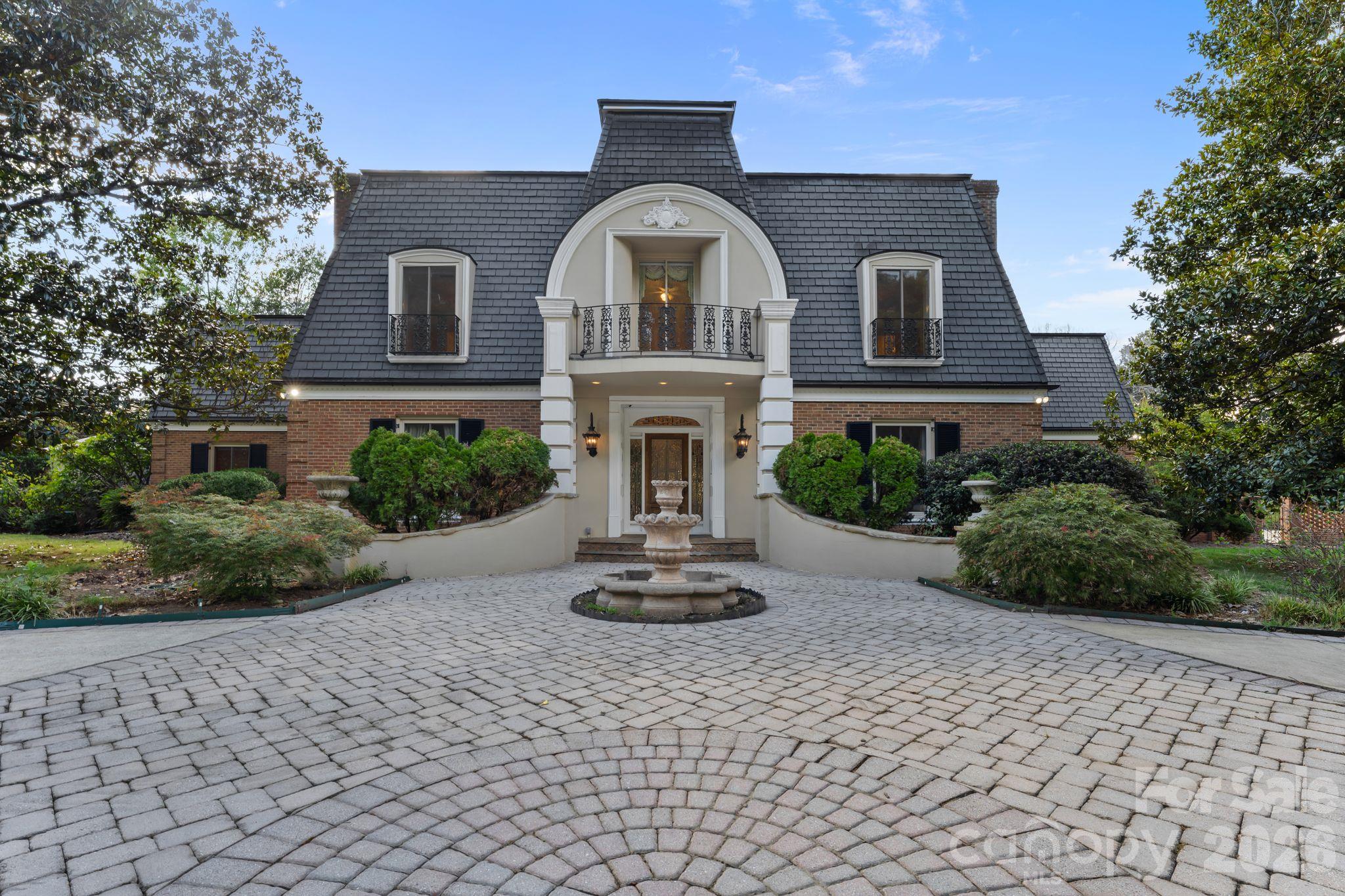 Front entryway with fountain - 3452 Sharon Road, Charlotte