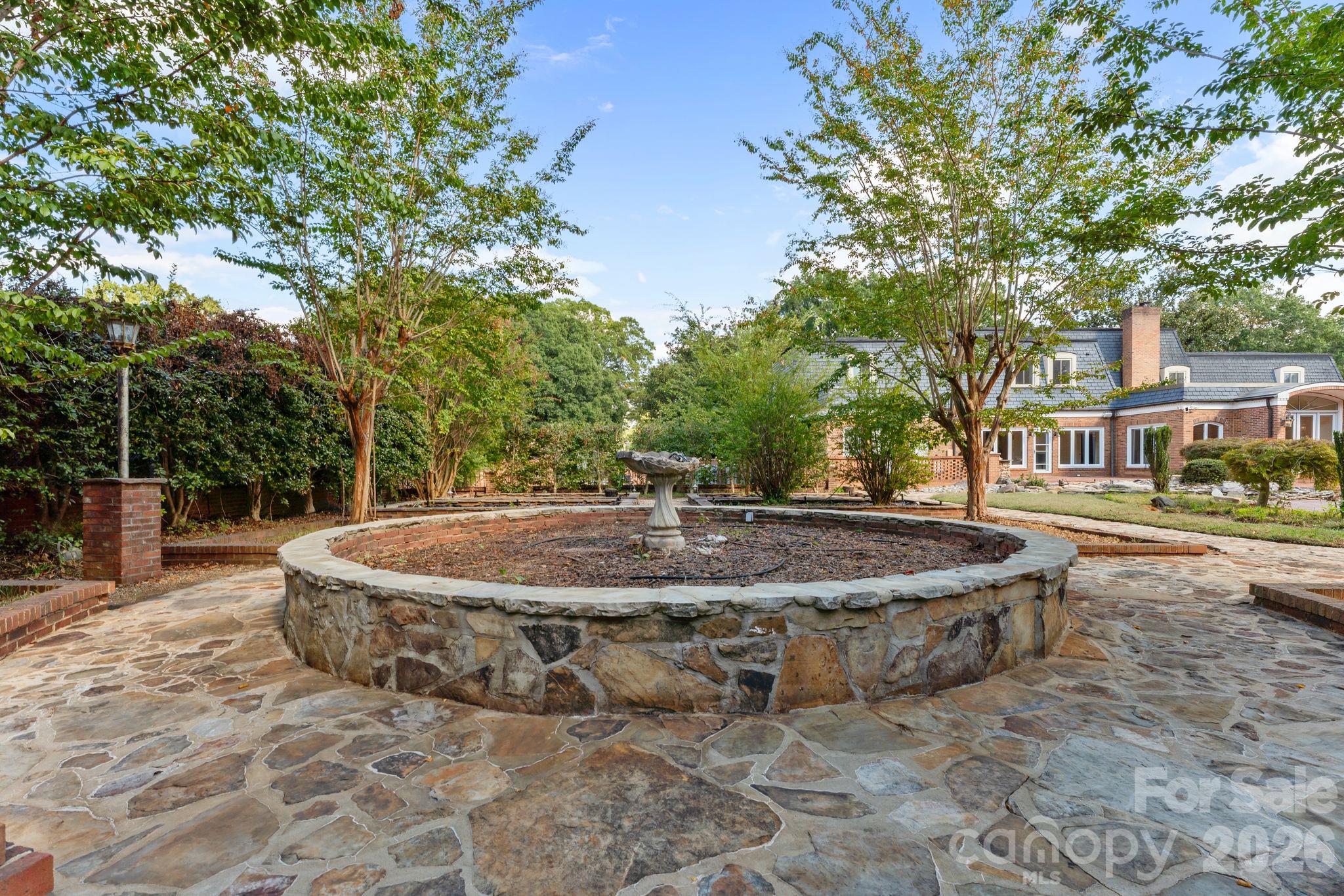 Fountain in backyard - 3452 Sharon Road, Charlotte