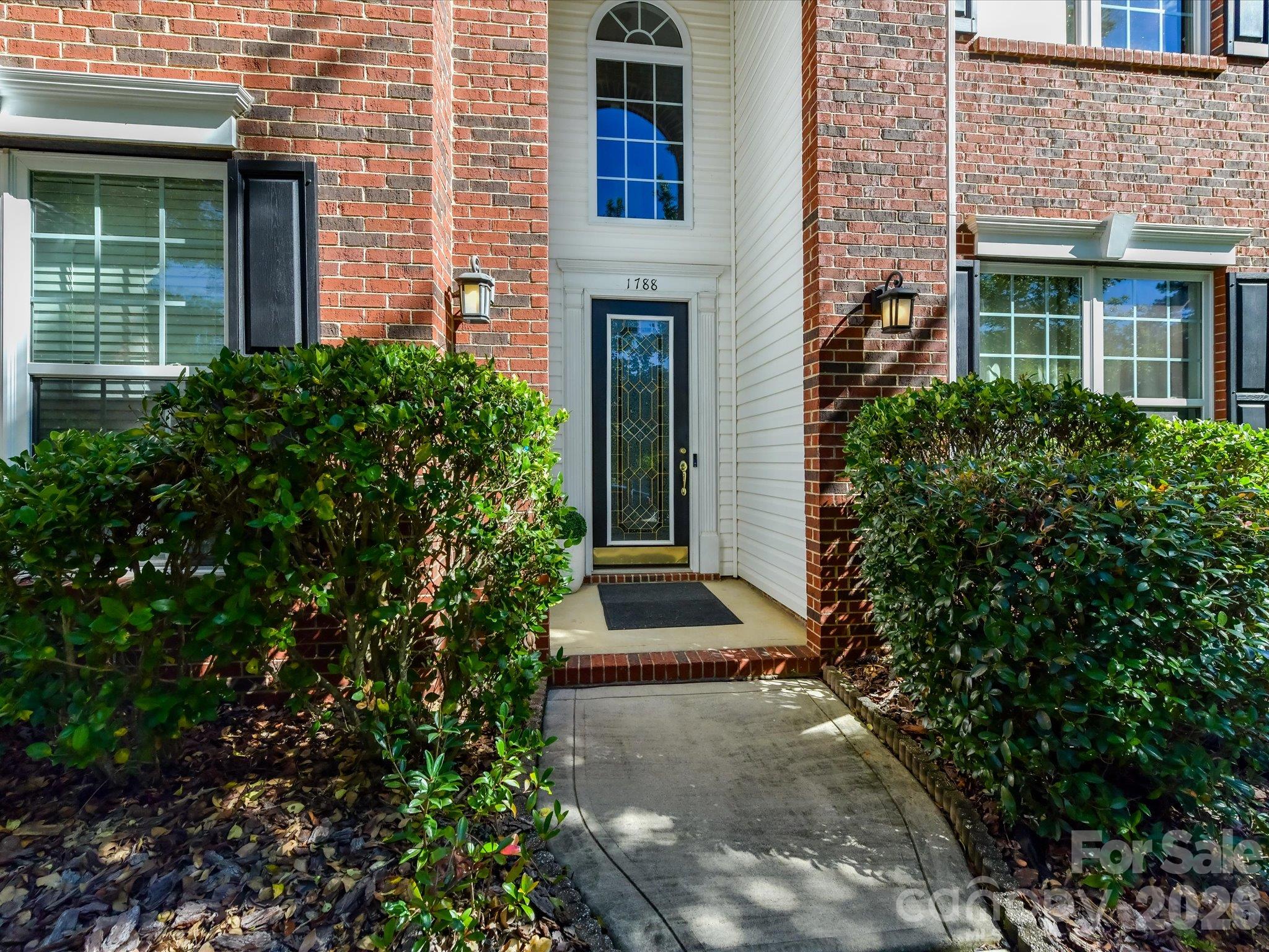 Nestled in the prestigious Verdict Ridge golf community, this beautifully maintained brick-front home offers exceptional curb appeal, a spacious three-car garage, and mature landscaping in one of Denver's most sought-after neighborhoods. - 1788 Oakmont Drive, Denver