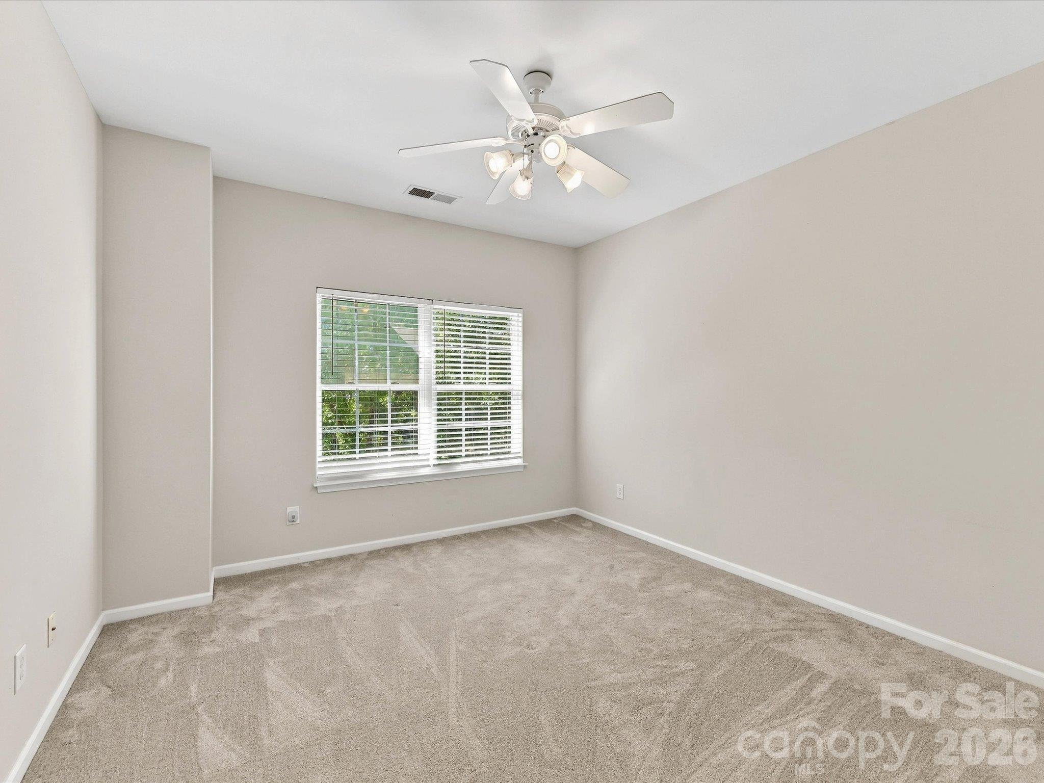Well-sized bedroom with a flexible layout, abundant natural light, and endless potential to personalize the space to fit your needs. - 1788 Oakmont Drive, Denver