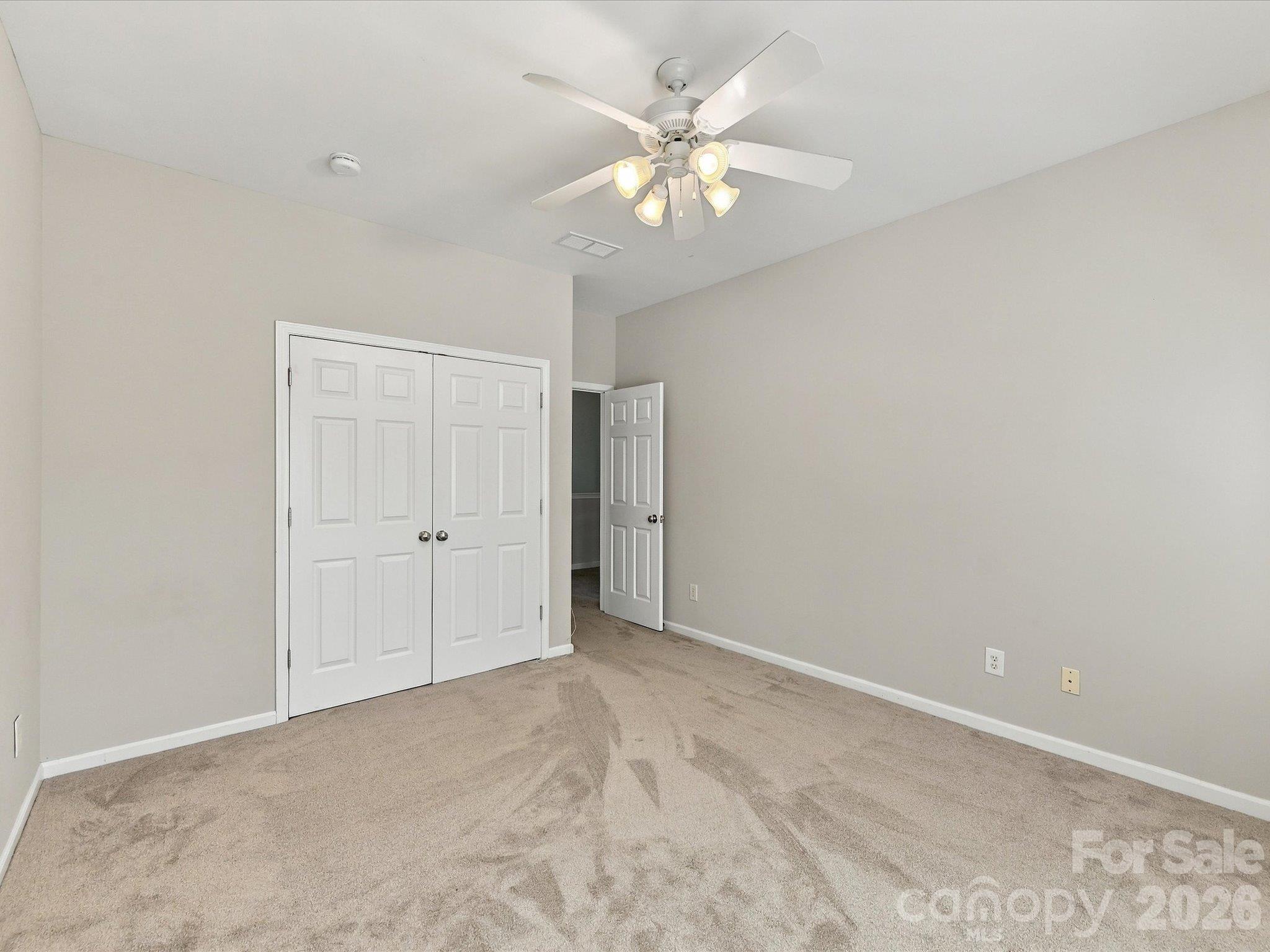 Well-sized bedroom with a flexible layout, abundant natural light, and endless potential to personalize the space to fit your needs. - 1788 Oakmont Drive, Denver