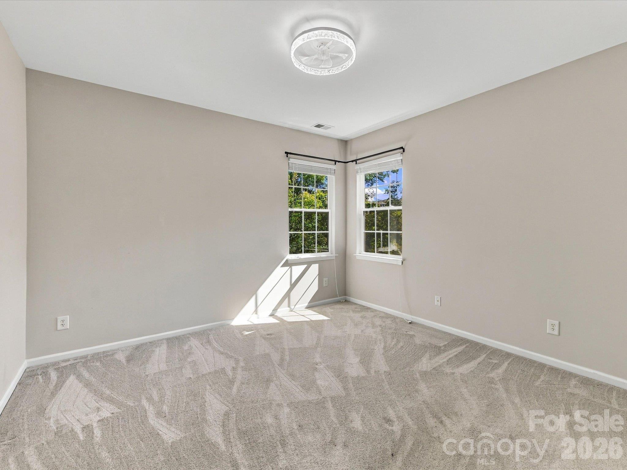 Well-sized bedroom with a flexible layout, abundant natural light, and endless potential to personalize the space to fit your needs. - 1788 Oakmont Drive, Denver